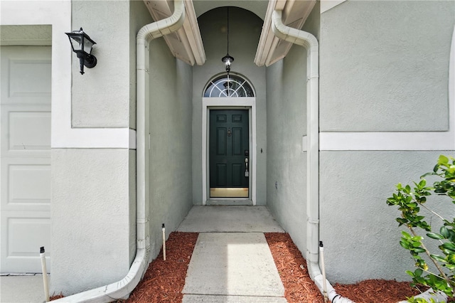 1725 Bondurant Way, Brandon, FL 33511 - doorway to property featuring stucco siding