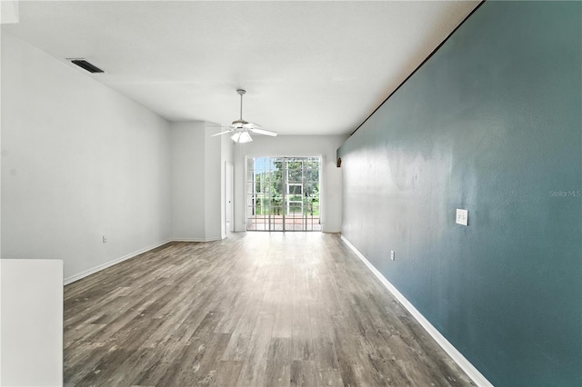 1725 Bondurant Way, Brandon, FL 33511 - empty room with wood finished floors and a ceiling fan