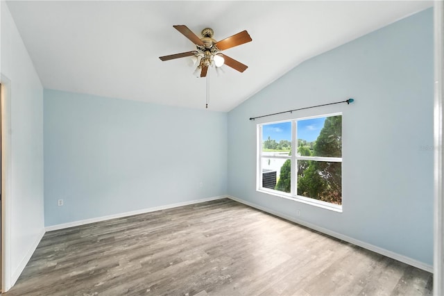 1725 Bondurant Way, Brandon, FL 33511 - spare room with lofted ceiling, wood finished floors, and a ceiling fan