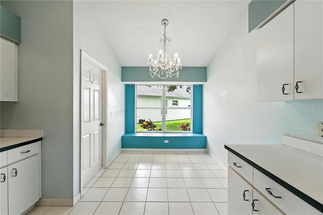 1725 Bondurant Way, Brandon, FL 33511 - unfurnished dining area with a chandelier and light tile patterned flooring