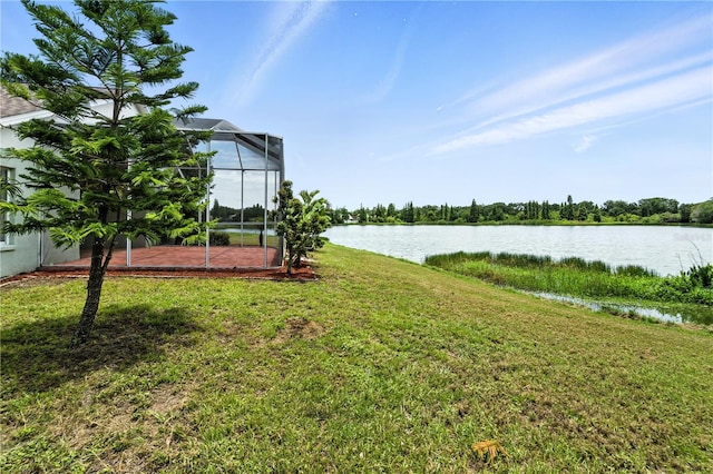 1725 Bondurant Way, Brandon, FL 33511 - view of green lawn with a water view, a lanai, and a patio