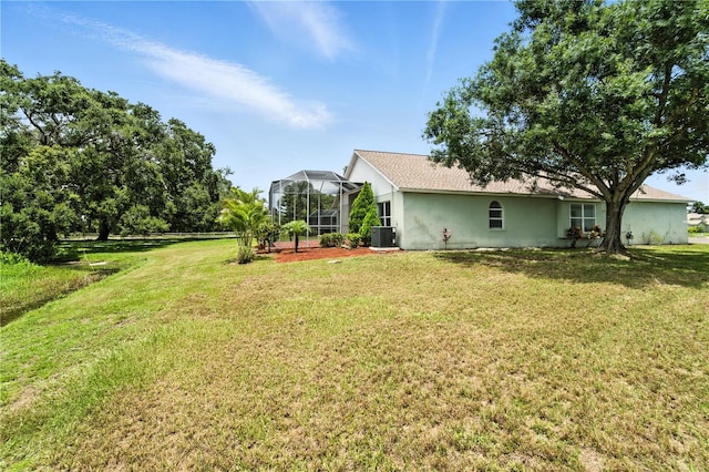 1725 Bondurant Way, Brandon, FL 33511 - view of grassy yard with glass enclosure