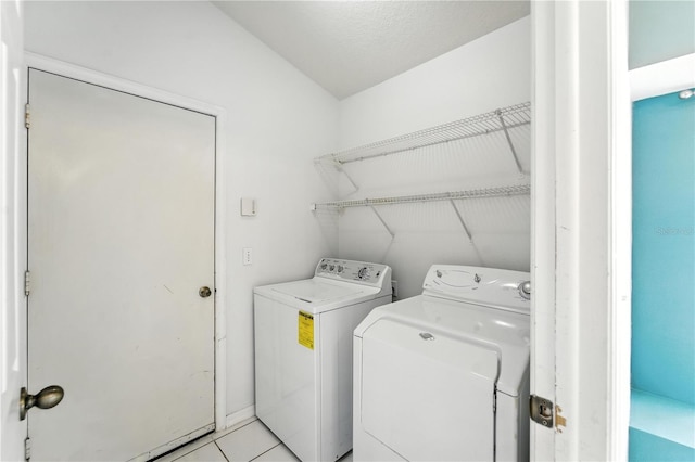 1725 Bondurant Way, Brandon, FL 33511 - laundry room with washer and clothes dryer and light tile patterned floors