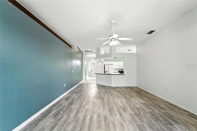 1725 Bondurant Way, Brandon, FL 33511 - unfurnished living room featuring a ceiling fan and wood finished floors