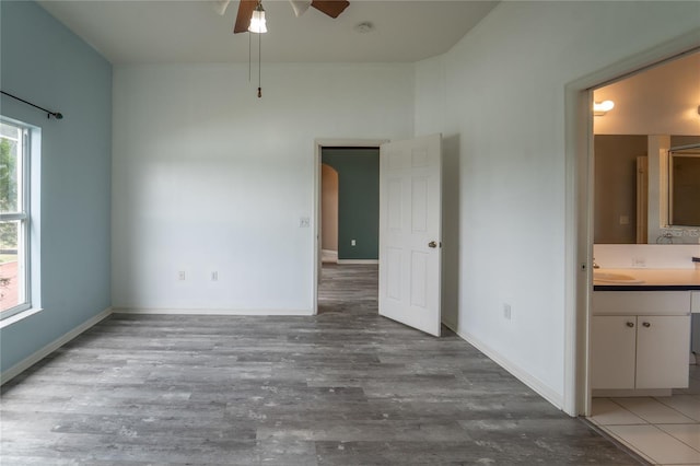 1725 Bondurant Way, Brandon, FL 33511 - unfurnished bedroom with light wood finished floors and ensuite bathroom