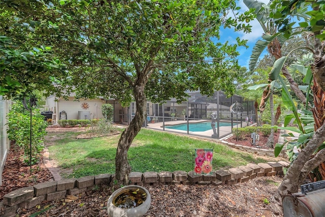 617 Valley Hill Dr, Brandon, FL 33510 - view of green lawn featuring a lanai