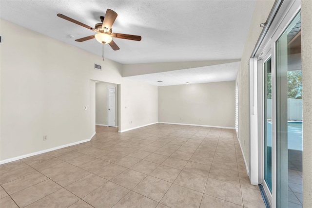 3840 Rolling Cir, Valrico, FL 33594 - empty room with light tile patterned floors, ceiling fan, and a textured ceiling