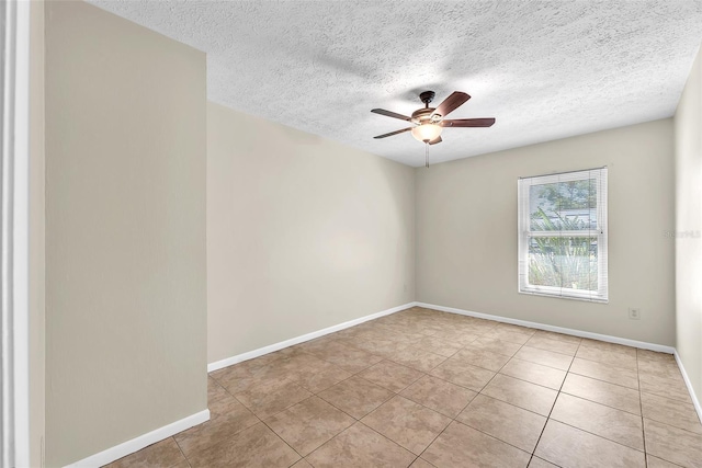 3840 Rolling Cir, Valrico, FL 33594 - empty room with ceiling fan, light tile patterned flooring, and a textured ceiling