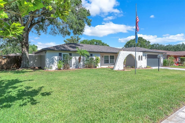 3840 Rolling Cir, Valrico, FL 33594 - ranch-style home featuring an attached garage, concrete driveway, and stucco siding