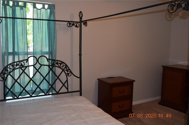 3600 Raintree Ter, Lakeland, FL 33803 - carpeted bedroom with baseboards