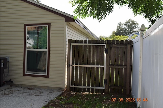 3600 Raintree Ter, Lakeland, FL 33803 - view of side of home featuring a gate