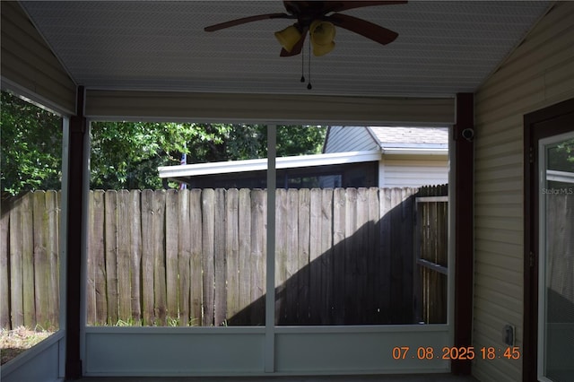 3600 Raintree Ter, Lakeland, FL 33803 - unfurnished sunroom featuring lofted ceiling and a ceiling fan
