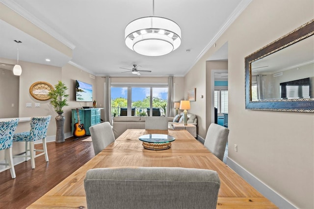 200 Main St Unit 204, Dunedin, FL 34698 - dining area with crown molding, wood finished floors, and ceiling fan