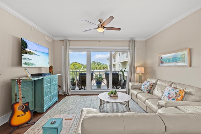200 Main St Unit 204, Dunedin, FL 34698 - living area with wood finished floors, ornamental molding, and a ceiling fan