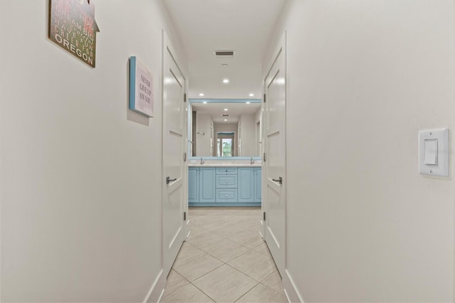 200 Main St Unit 204, Dunedin, FL 34698 - hallway featuring light tile patterned floors and recessed lighting