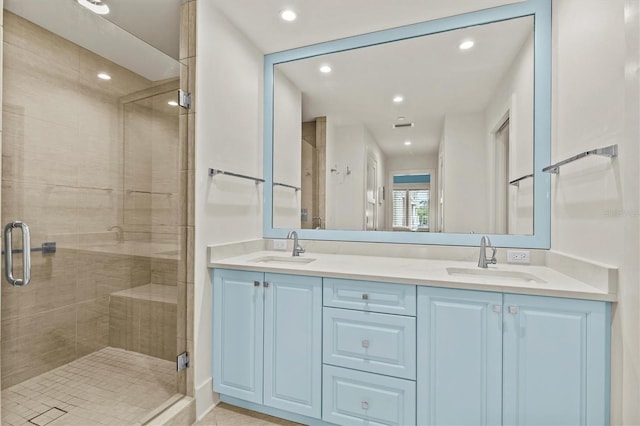 200 Main St Unit 204, Dunedin, FL 34698 - full bathroom featuring a shower stall, double vanity, and recessed lighting