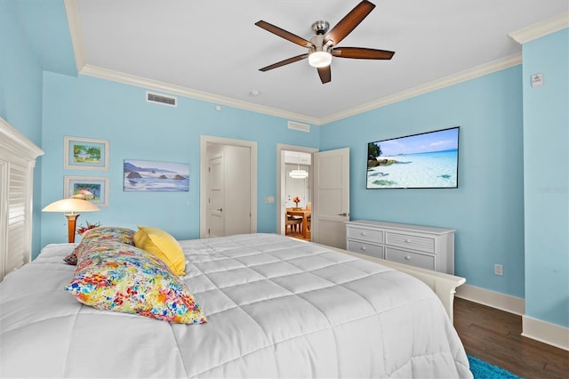 200 Main St Unit 204, Dunedin, FL 34698 - bedroom featuring wood finished floors, ornamental molding, and ceiling fan