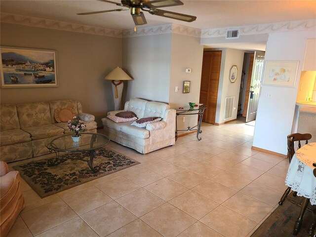 3849 Sailmaker Ln Unit 0, Holiday, FL 34691 - living room with ceiling fan and light tile patterned floors