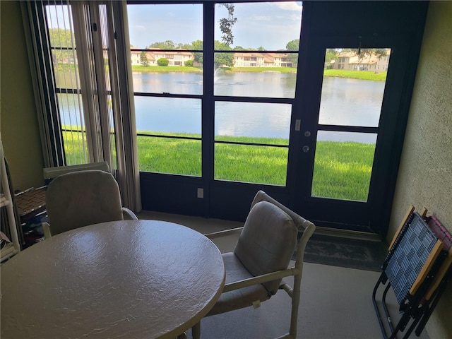3849 Sailmaker Ln Unit 0, Holiday, FL 34691 - sunroom / solarium with a water view