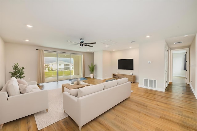 8717 Sanders Tree Loop, Wesley Chapel, FL 33545 - living area with light wood-type flooring, ceiling fan, and recessed lighting