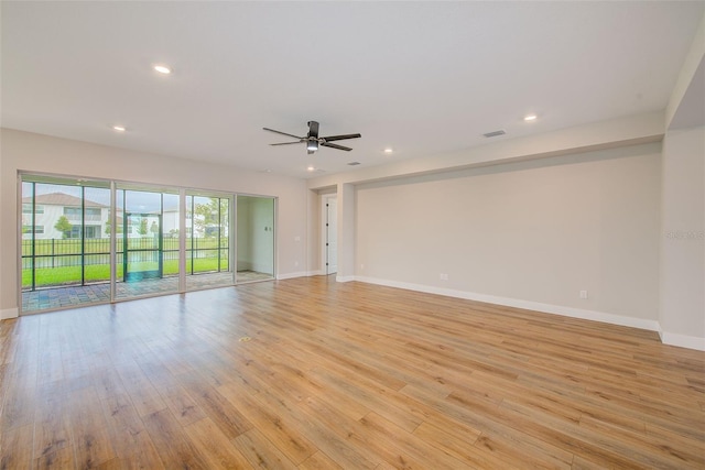 8717 Sanders Tree Loop, Wesley Chapel, FL 33545 - empty room featuring a ceiling fan, light wood finished floors, and recessed lighting
