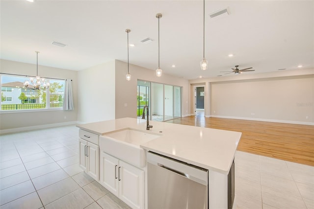 8717 Sanders Tree Loop, Wesley Chapel, FL 33545 - kitchen featuring dishwasher, open floor plan, light tile patterned floors, light countertops, and recessed lighting