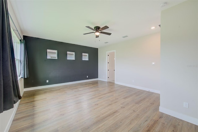 8717 Sanders Tree Loop, Wesley Chapel, FL 33545 - spare room with a ceiling fan, a smoke detector, light wood-type flooring, and recessed lighting