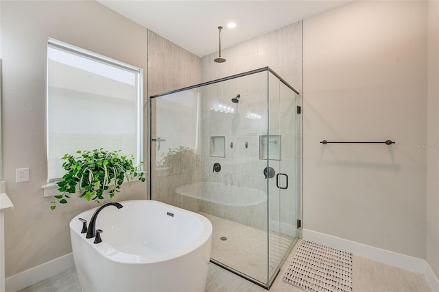 8717 Sanders Tree Loop, Wesley Chapel, FL 33545 - full bathroom with a freestanding bath and a shower stall