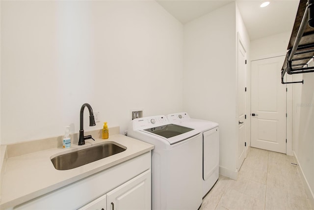 8717 Sanders Tree Loop, Wesley Chapel, FL 33545 - laundry area with washing machine and clothes dryer, cabinet space, recessed lighting, and light tile patterned floors