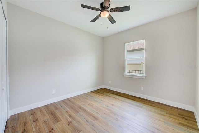 8717 Sanders Tree Loop, Wesley Chapel, FL 33545 - empty room featuring wood finished floors and a ceiling fan