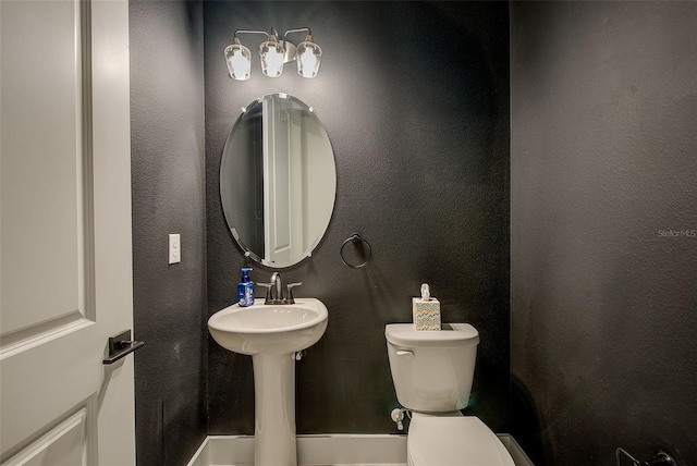8717 Sanders Tree Loop, Wesley Chapel, FL 33545 - bathroom featuring toilet