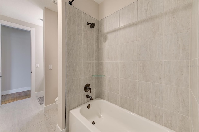 8717 Sanders Tree Loop, Wesley Chapel, FL 33545 - bathroom with washtub / shower combination and tile patterned flooring