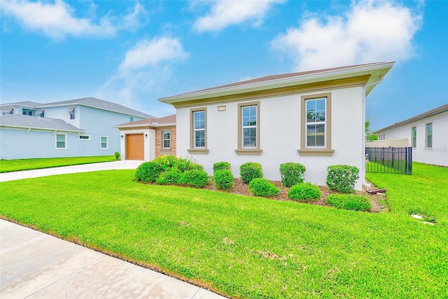8717 Sanders Tree Loop, Wesley Chapel, FL 33545 - view of front of house featuring concrete driveway, an attached garage, and stucco siding