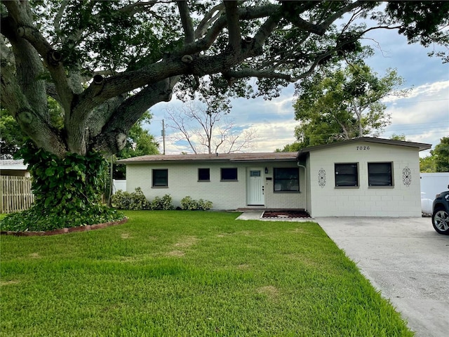 7026 20th St N, Saint Petersburg, FL 33702 - ranch-style home featuring concrete block siding