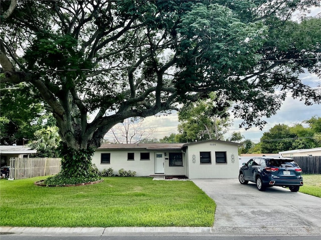 7026 20th St N, Saint Petersburg, FL 33702 - single story home with concrete driveway