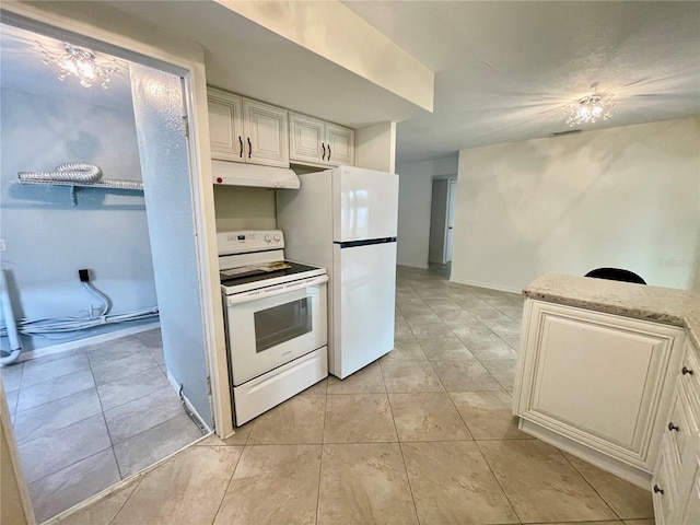 7026 20th St N, Saint Petersburg, FL 33702 - kitchen with white appliances, under cabinet range hood, light tile patterned floors, white cabinetry, and light stone counters