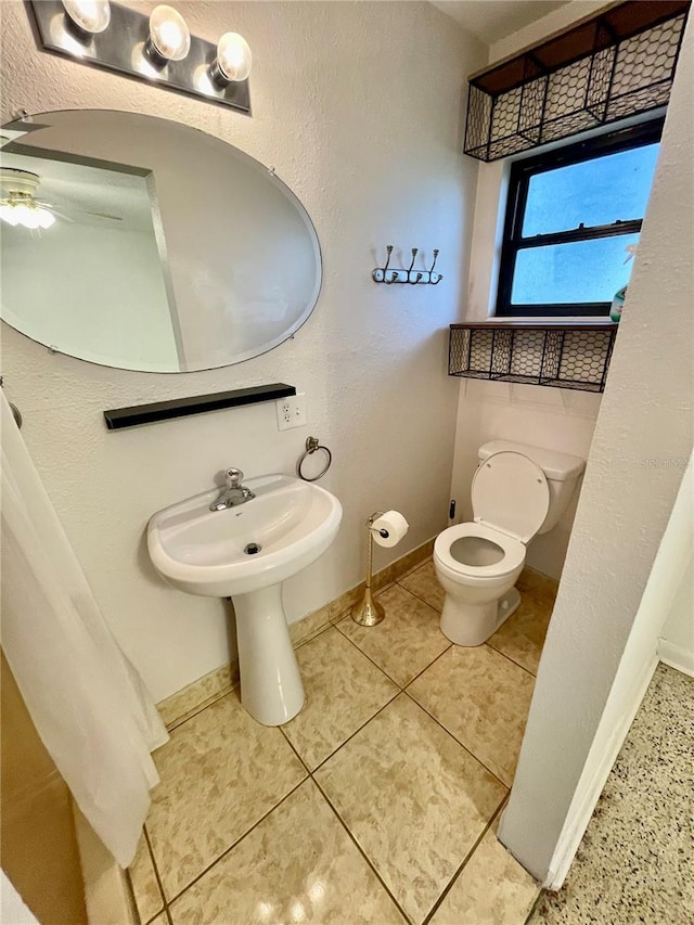 7026 20th St N, Saint Petersburg, FL 33702 - half bath with toilet and a ceiling fan