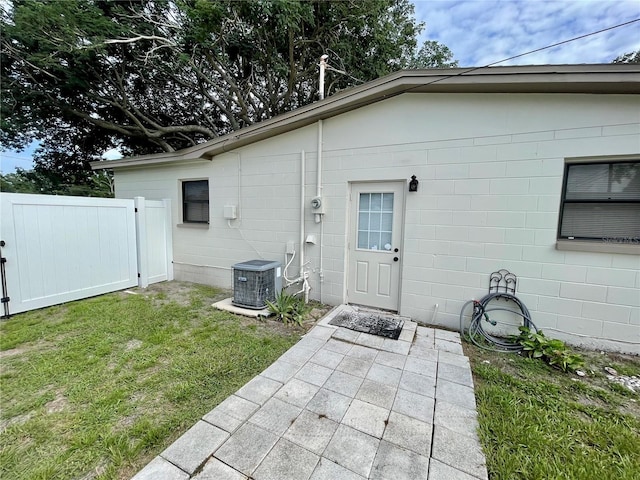 7026 20th St N, Saint Petersburg, FL 33702 - view of exterior entry featuring concrete block siding