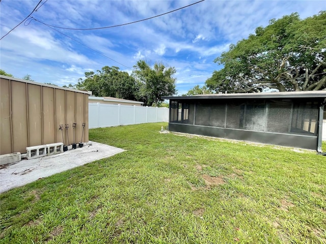 7026 20th St N, Saint Petersburg, FL 33702 - fenced backyard with a sunroom