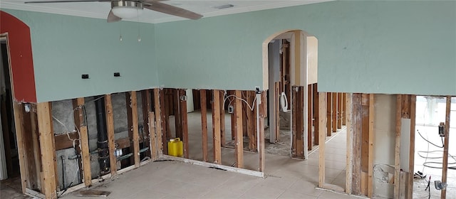 7623 Gulf Blvd, St Pete Beach, FL 33706 - misc room with crown molding, arched walkways, and a ceiling fan