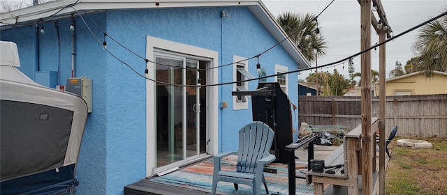 7623 Gulf Blvd, St Pete Beach, FL 33706 - view of side of home with stucco siding