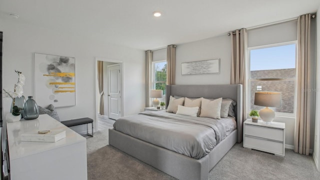 2615 Hardin Way, Zephyrhills, FL 33541 - bedroom featuring light colored carpet and recessed lighting