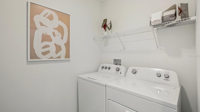 2615 Hardin Way, Zephyrhills, FL 33541 - washroom with washing machine and clothes dryer