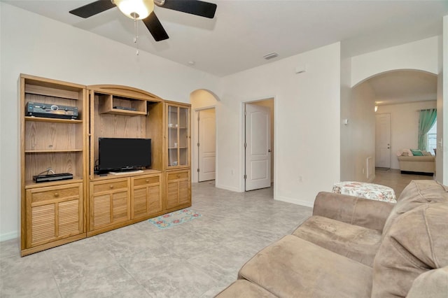 11240 Merganser Way, New Port Richey, FL 34654 - living room featuring arched walkways and a ceiling fan