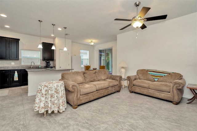 11240 Merganser Way, New Port Richey, FL 34654 - living room with healthy amount of natural light, ceiling fan, and recessed lighting