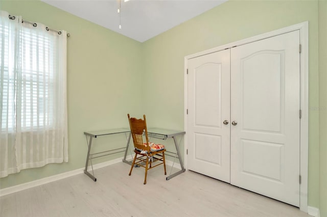 11240 Merganser Way, New Port Richey, FL 34654 - office with light wood-style flooring and a ceiling fan