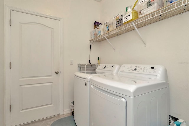 11240 Merganser Way, New Port Richey, FL 34654 - laundry area featuring washer and dryer