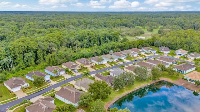 11240 Merganser Way, New Port Richey, FL 34654 - aerial perspective of suburban area with a forest and a nearby body of water