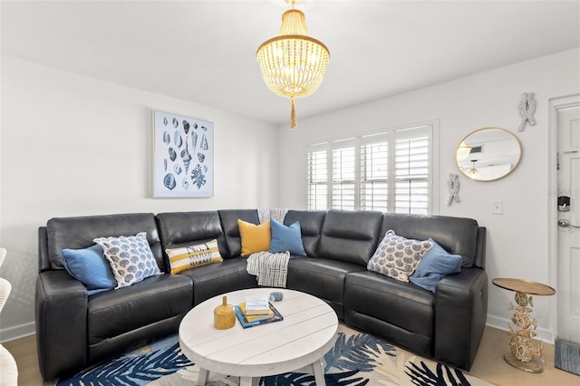 10280 Gulf Blvd Unit 12, Treasure Island, FL 33706 - living room featuring a chandelier and baseboards