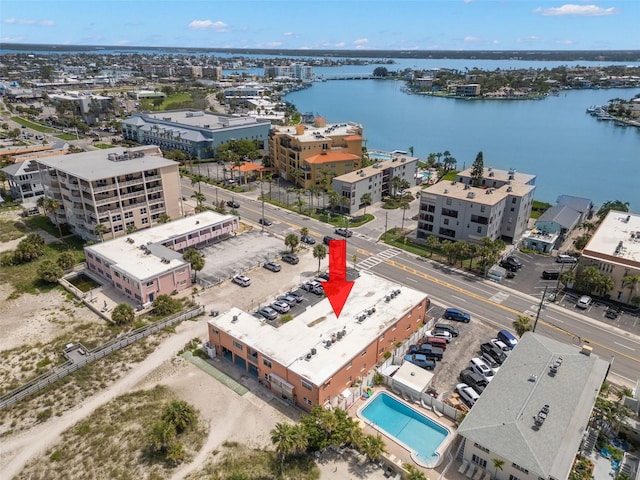 10280 Gulf Blvd Unit 12, Treasure Island, FL 33706 - drone / aerial view of a large body of water and a pool area